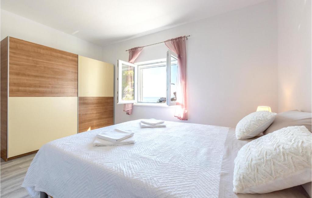 Posteľ alebo postele v izbe v ubytovaní Cozy Apartment In Suvi Potok, Jesenice,