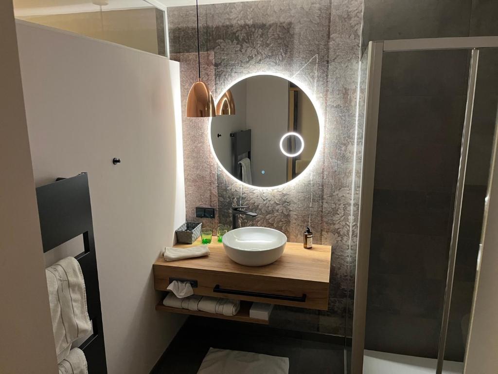 Koupelna v ubytování Hotel Hecher