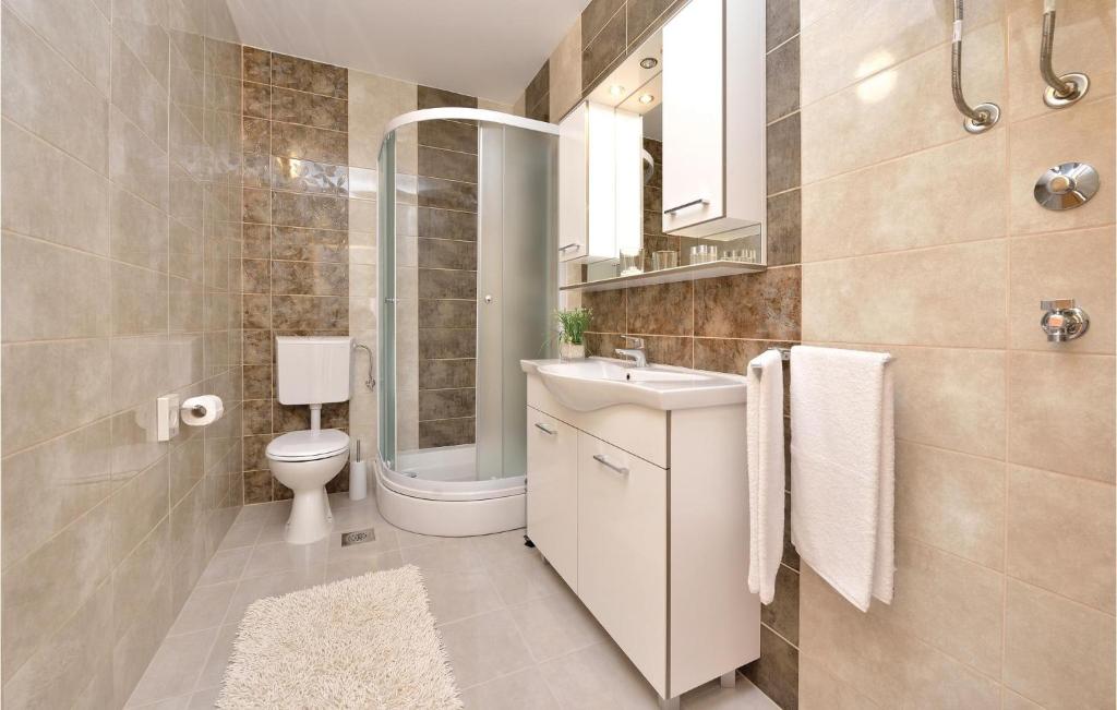 Kúpeľňa v ubytovaní Apartment Vrsi-Mulo 01