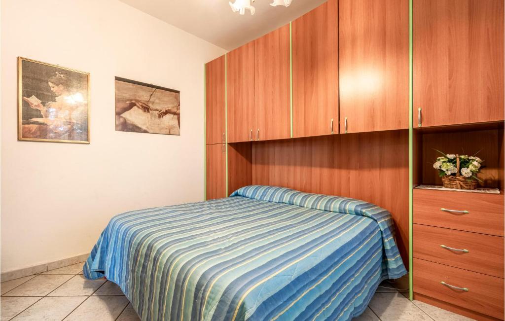 A bed or beds in a room at Ketty 4
