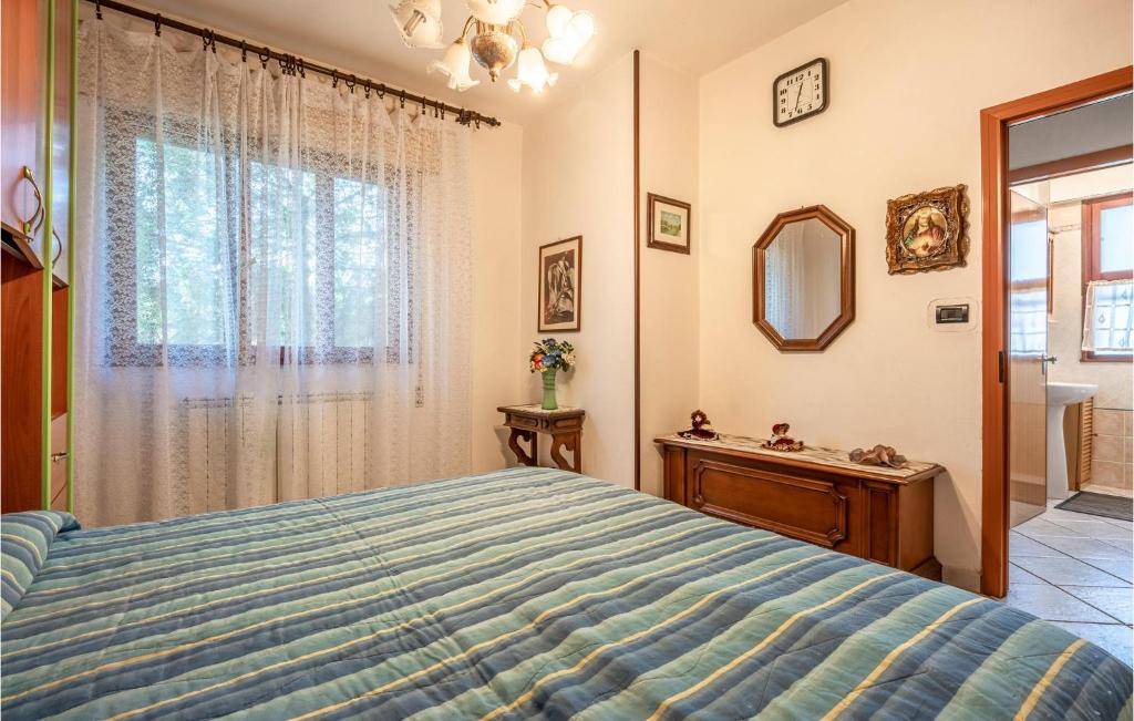 A bed or beds in a room at Ketty 4