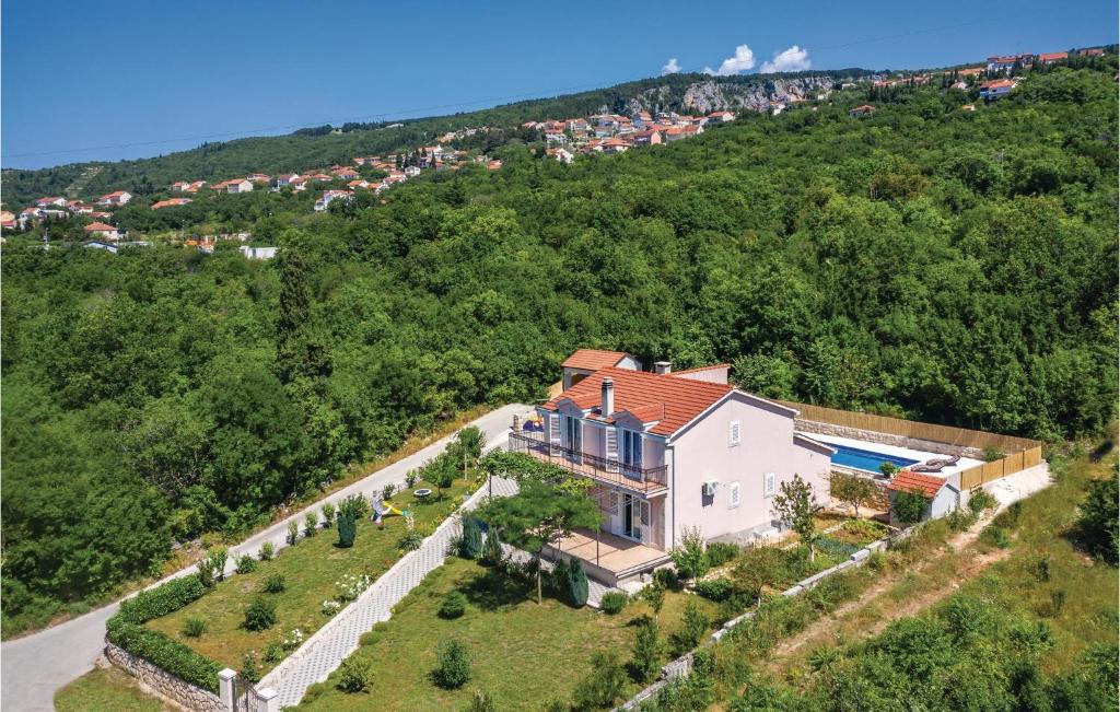an aerial view of a house on a hill at Cozy Home In Glavina Donja With Kitchen in Donja Glavina