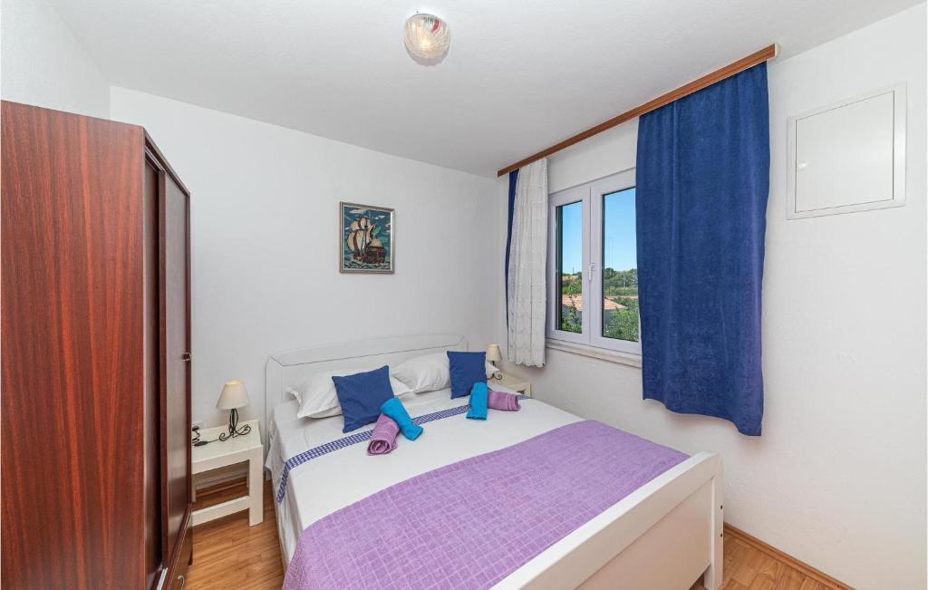 Postel nebo postele na pokoji v ubytování Holiday Home Borak Croatia