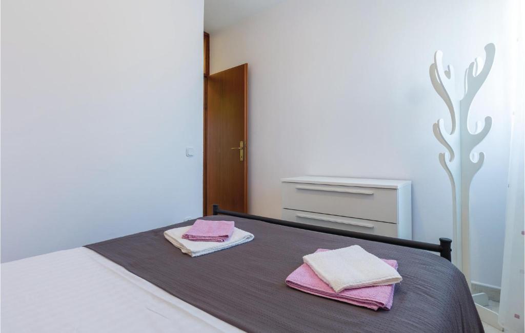 Posteľ alebo postele v izbe v ubytovaní Two-Bedroom Apartment In Porec