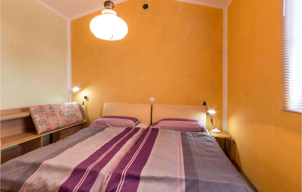 Łóżko lub łóżka w pokoju w obiekcie Holiday Home Betiga With Sea View Vi