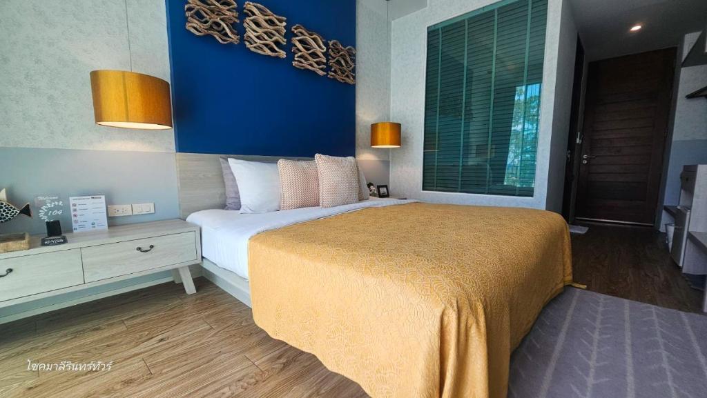Postel nebo postele na pokoji v ubytování Mukrada House Boutique Hometel Krabi