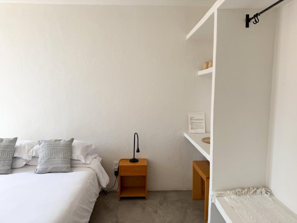 Letto o letti in una camera di Casa 821 Guest House