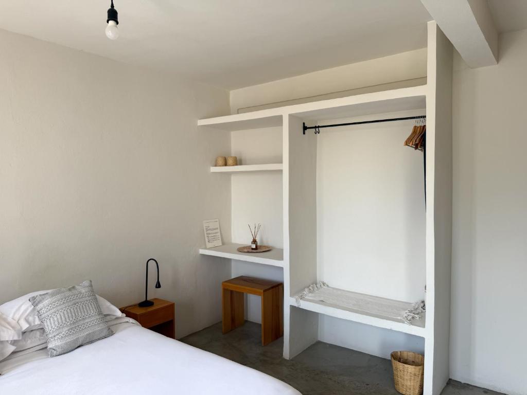 Letto o letti in una camera di Casa 821 Guest House