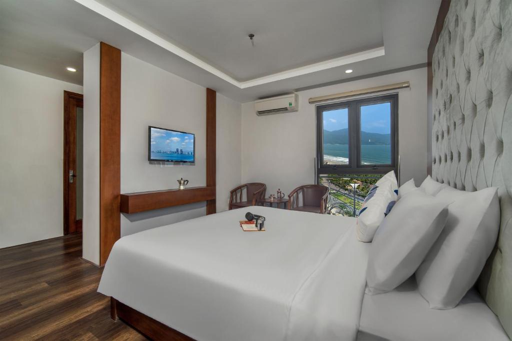 TV a/nebo společenská místnost v ubytování Delicate Hotel