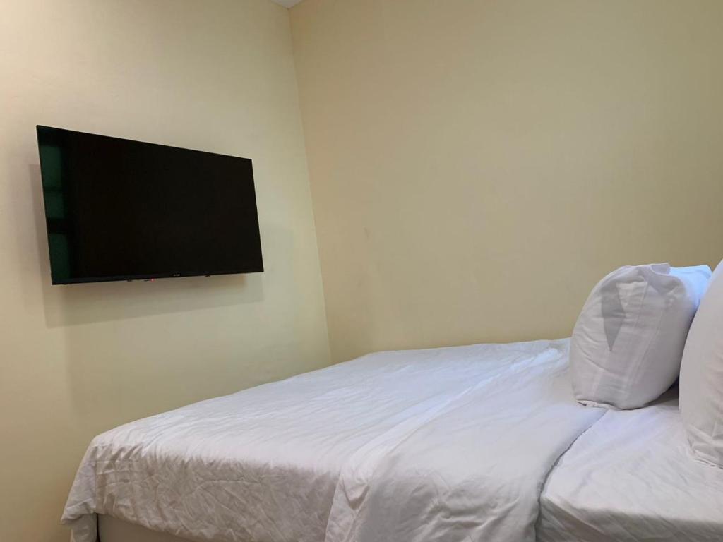 TV o dispositivi per l'intrattenimento presso T Lodge, Kapit