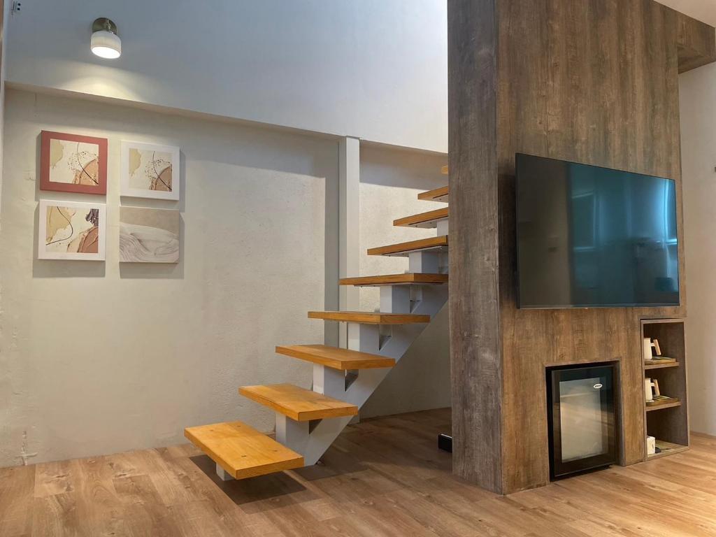 TV a/nebo společenská místnost v ubytování How Has Homestay