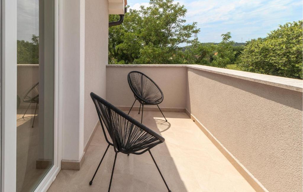 Balkón nebo terasa v ubytování 4 Bedroom Stunning Home In Lopar