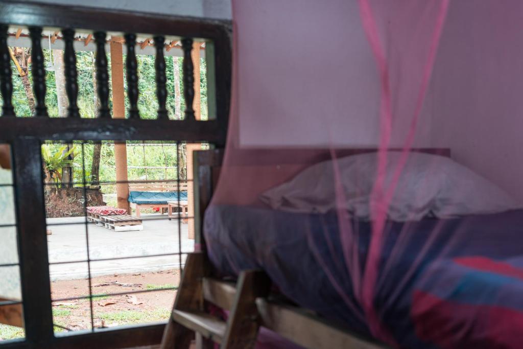 Postel nebo postele na pokoji v ubytování Hostel Singha Lounge