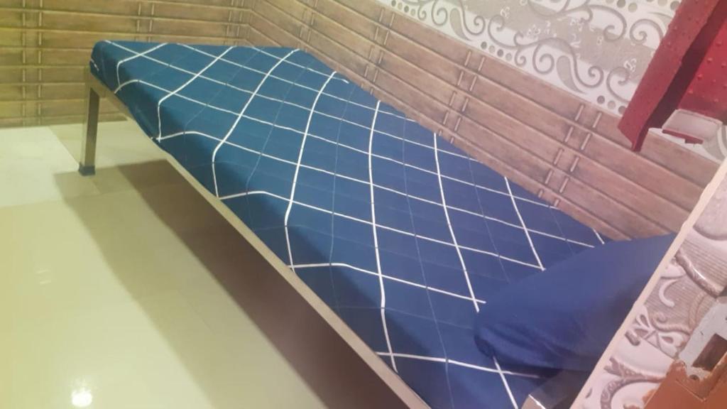 Postel nebo postele na pokoji v ubytování S.S.K RESIDENCY