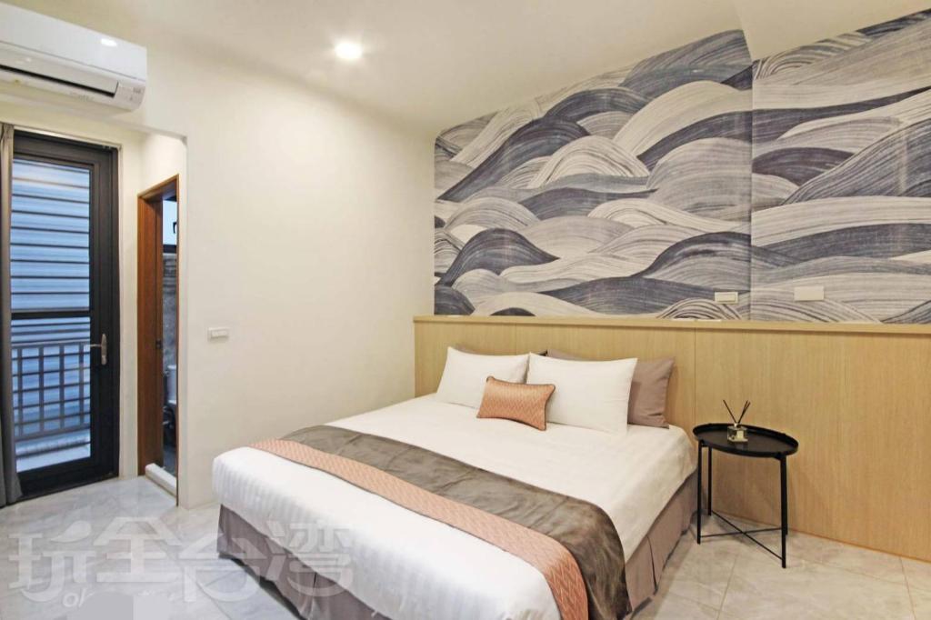 Postel nebo postele na pokoji v ubytování Station Sea B&B