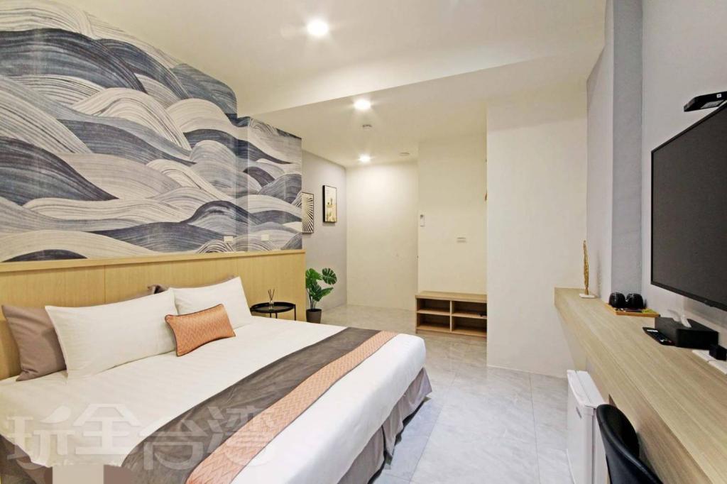TV a/nebo společenská místnost v ubytování Station Sea B&B