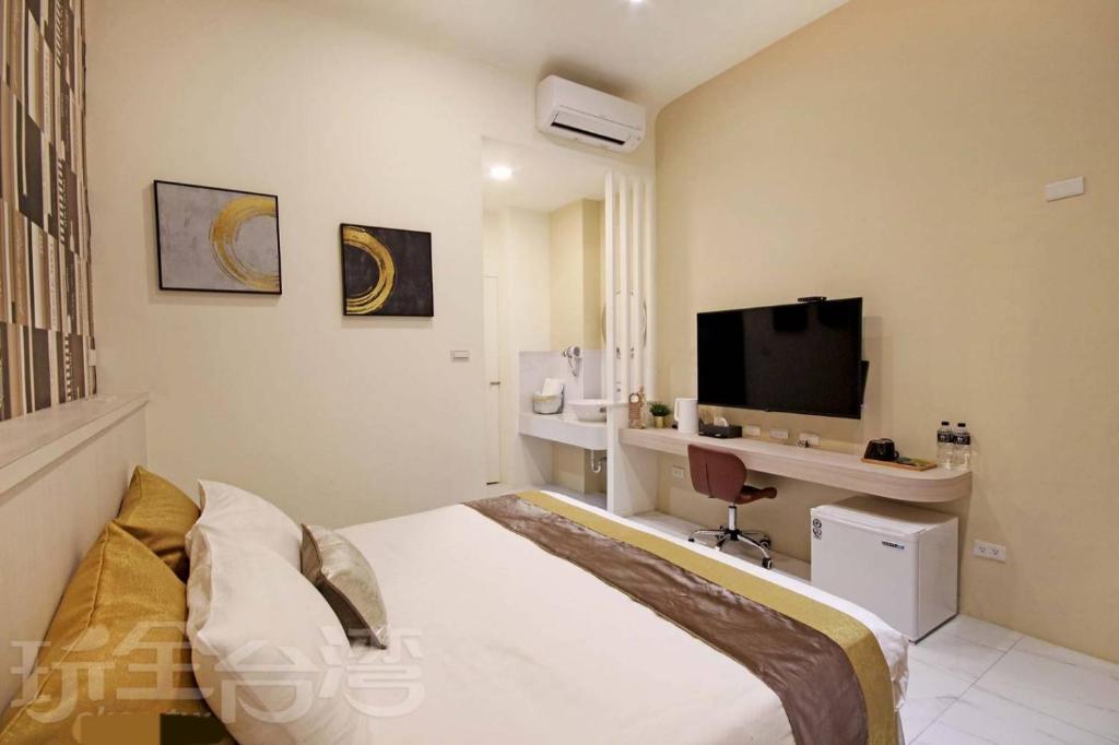 TV a/nebo společenská místnost v ubytování Station Sea B&B