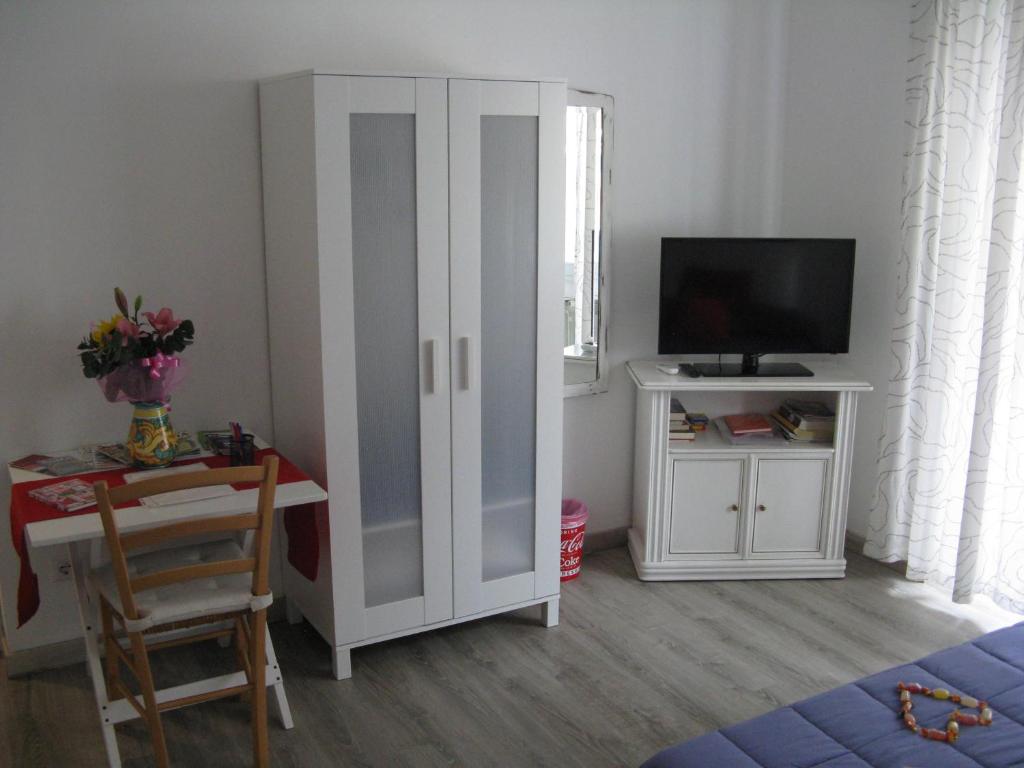 Uma televisão e/ou sistema de entretenimento em Stesi Vacanze