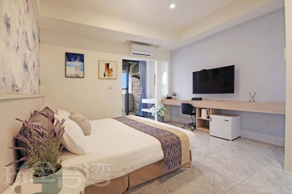 TV a/nebo společenská místnost v ubytování Station Sea B&B