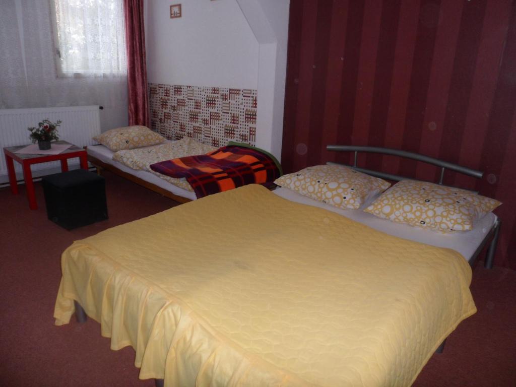 Postel nebo postele na pokoji v ubytování Pension Mikulka