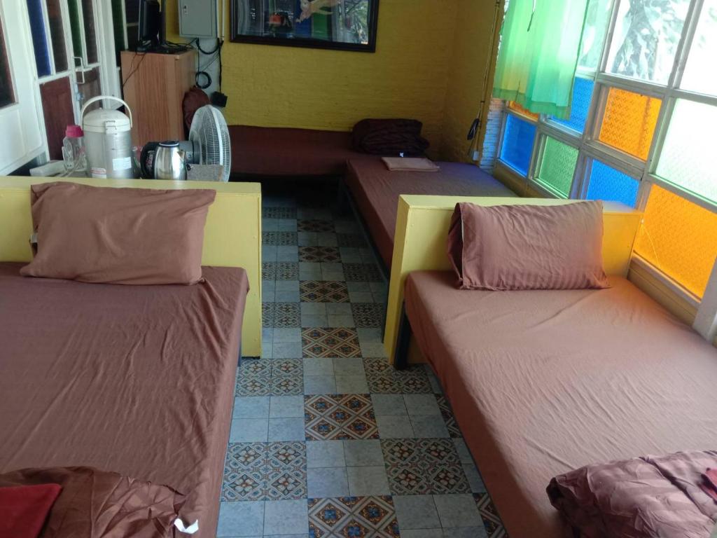 Postel nebo postele na pokoji v ubytování Bansuan Inthanon Eco Resort