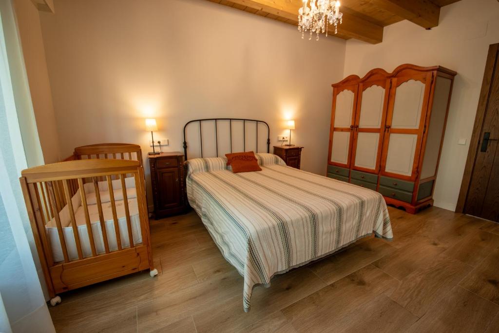Cama o camas de una habitación en MASIA CLOTATS