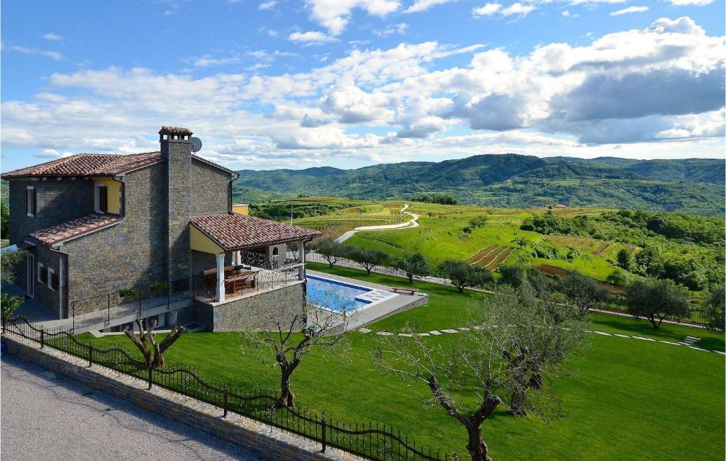 an aerial view of a house with a swimming pool at Villa Olea in Buzet