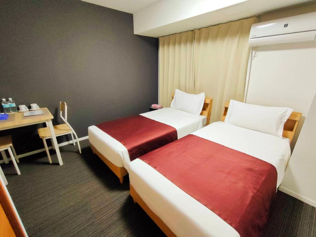 Ένα ή περισσότερα κρεβάτια σε δωμάτιο στο incense上野根岸601