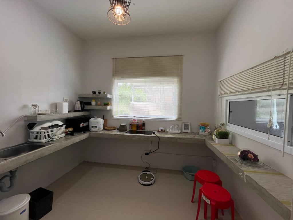Kuchyň nebo kuchyňský kout v ubytování Private house khonkaen