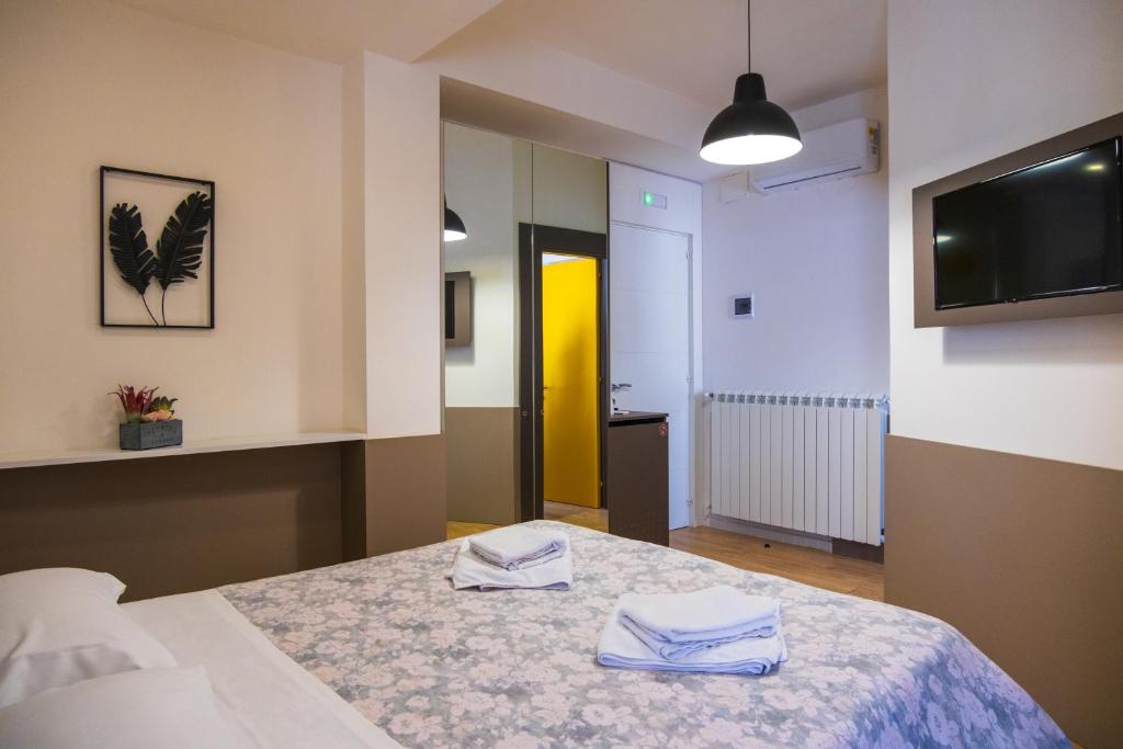 Postel nebo postele na pokoji v ubytování Avezzano 3e60