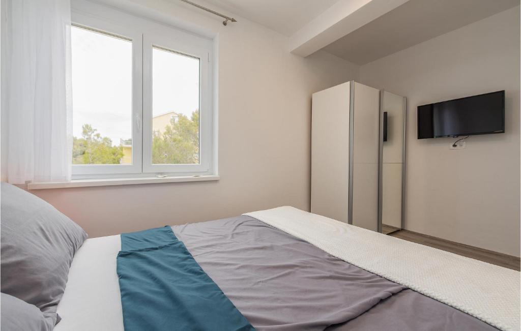 Posteľ alebo postele v izbe v ubytovaní Nice Apartment In Bibinje With Wifi