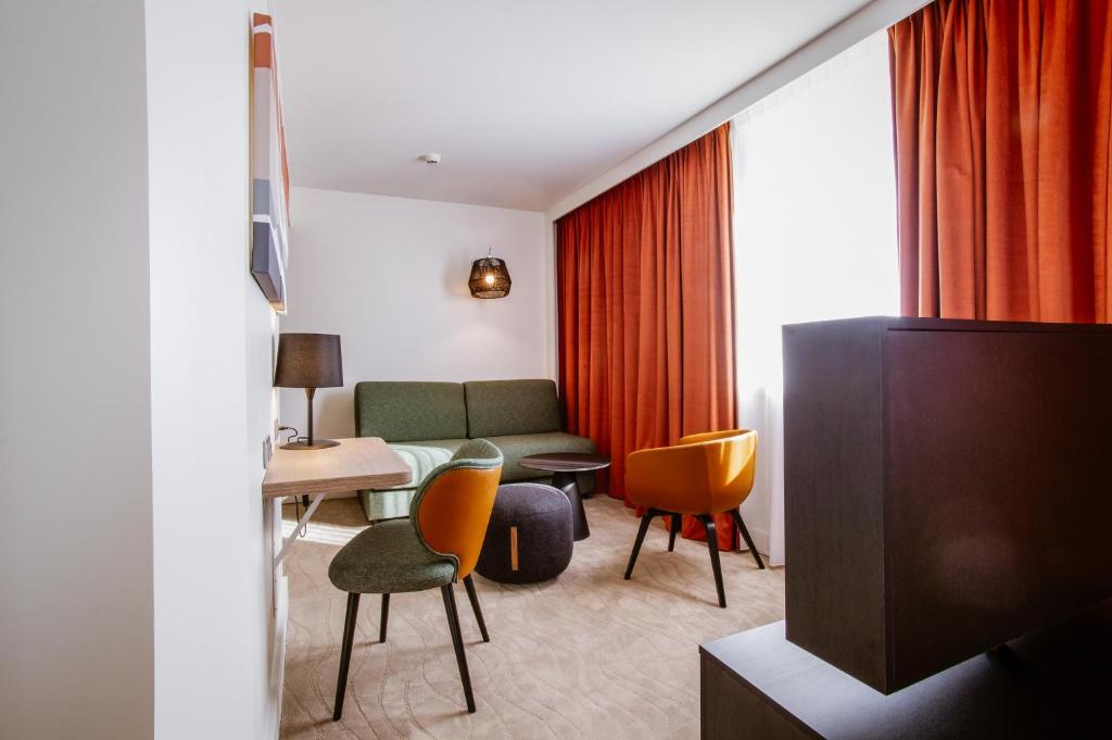 Posezení v ubytování Novotel Lyon Centre-Confluence Bord de Saone