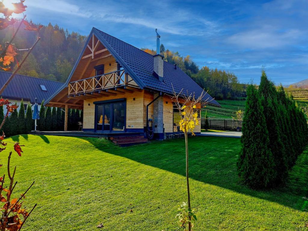 Vonkajšia záhrada v ubytovaní Domek Tworkowo Komfortowy Całoroczny