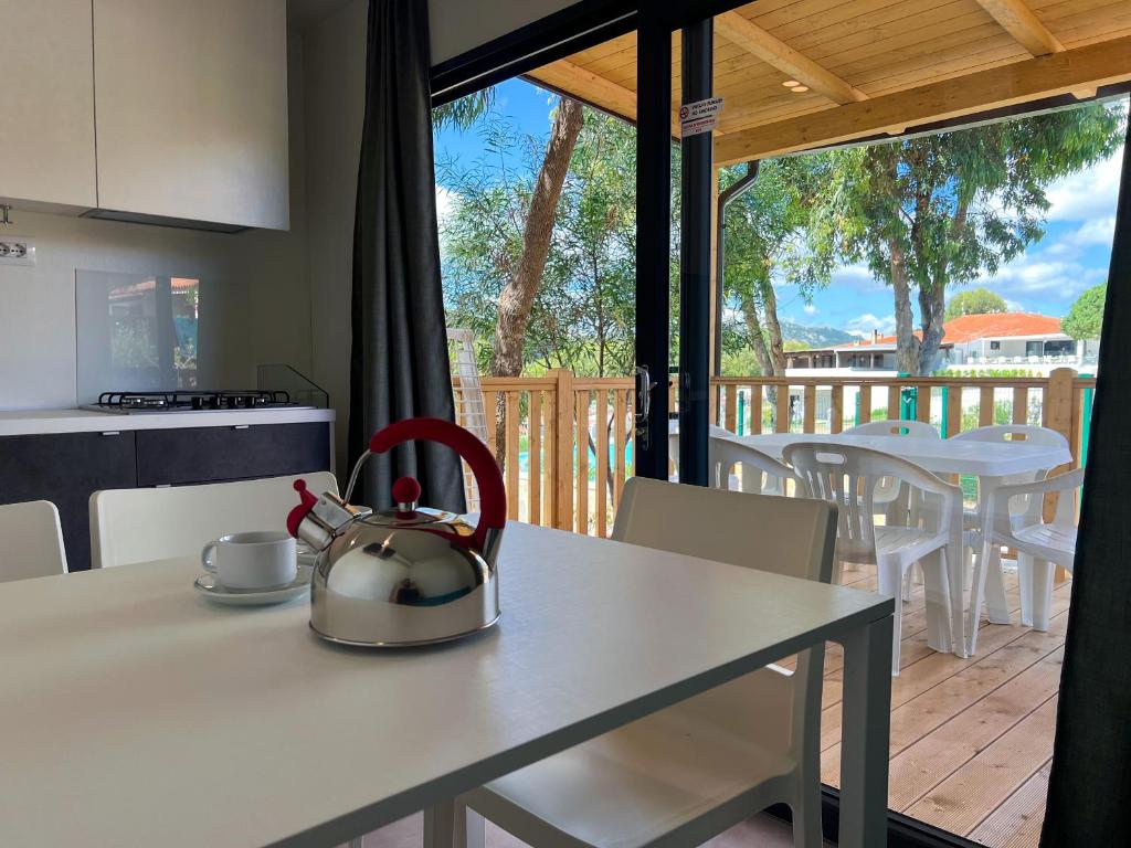 Balkón nebo terasa v ubytování Camping Village Capo D'Orso