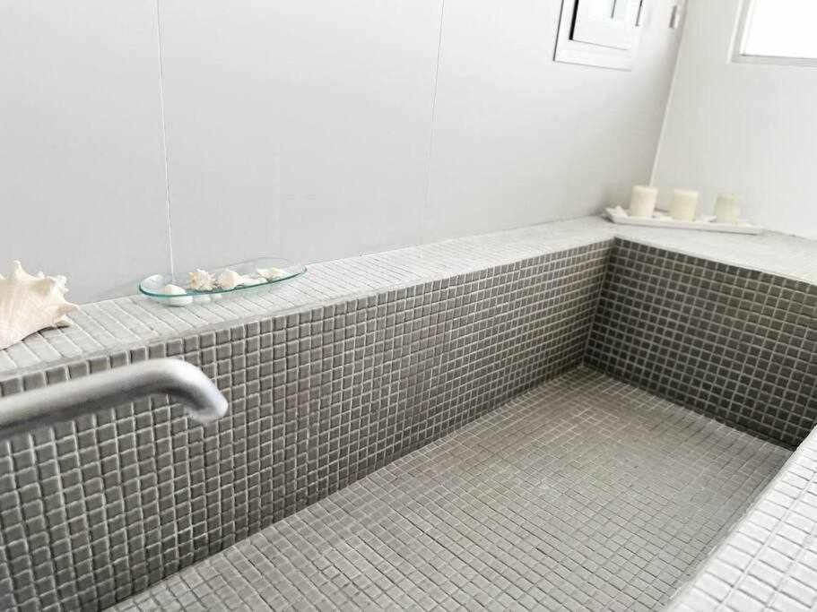 Koupelna v ubytování Villa Itaca Vista mar y piscina climatizada