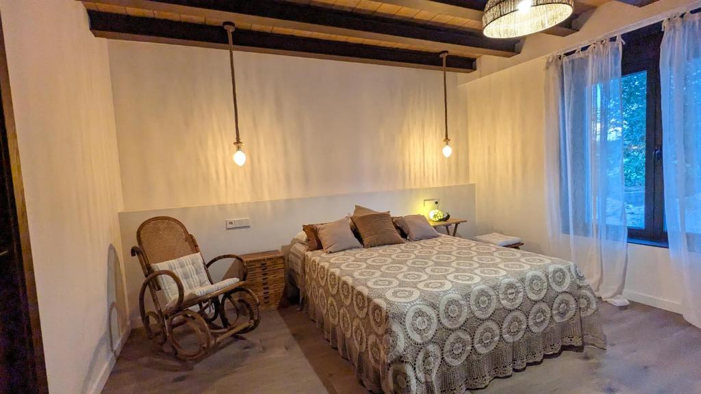 Cama o camas de una habitación en MASIA CLOTATS