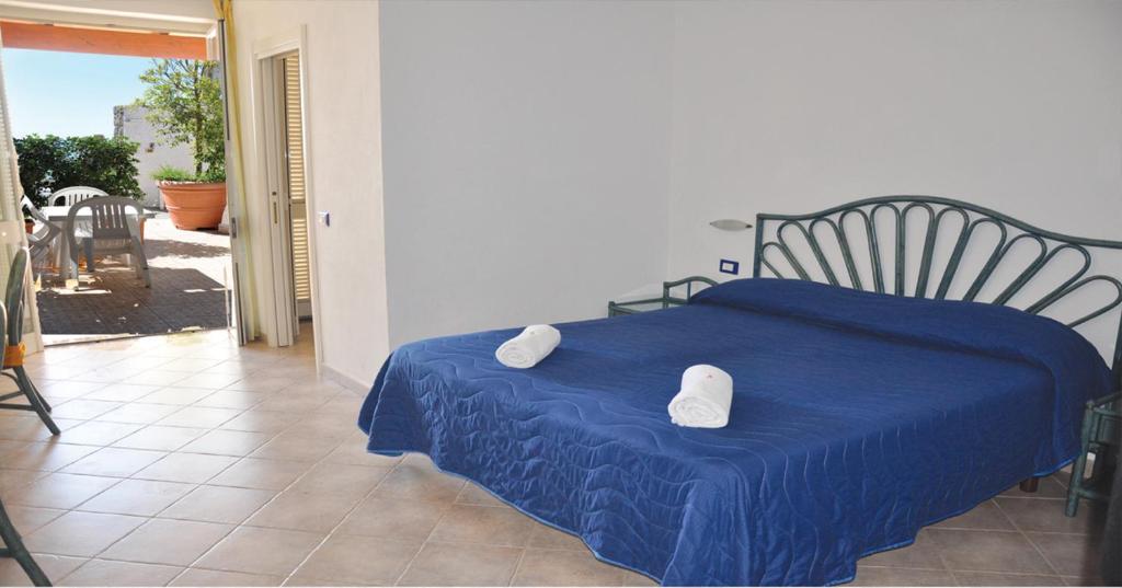 Postel nebo postele na pokoji v ubytování Villa Myremi