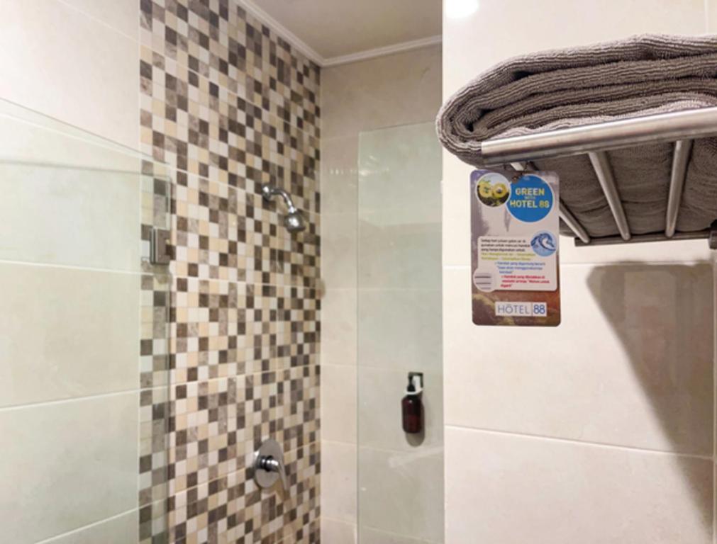 Koupelna v ubytování Hotel 88 Embong Kenongo - Kayun By WH