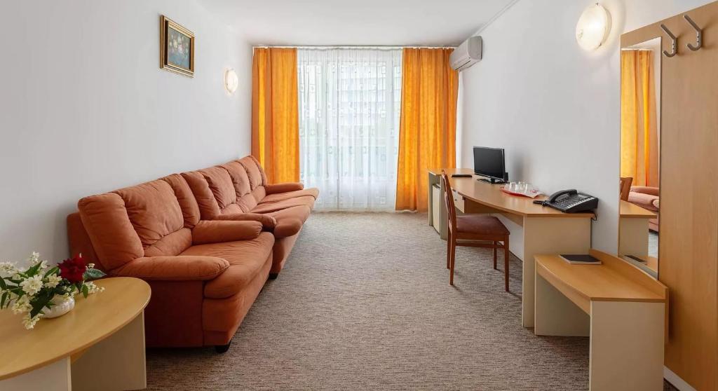 TV a/nebo společenská místnost v ubytování Hotel AquaPark Balada Saturn - ULTRA ALL INCLUSIVE