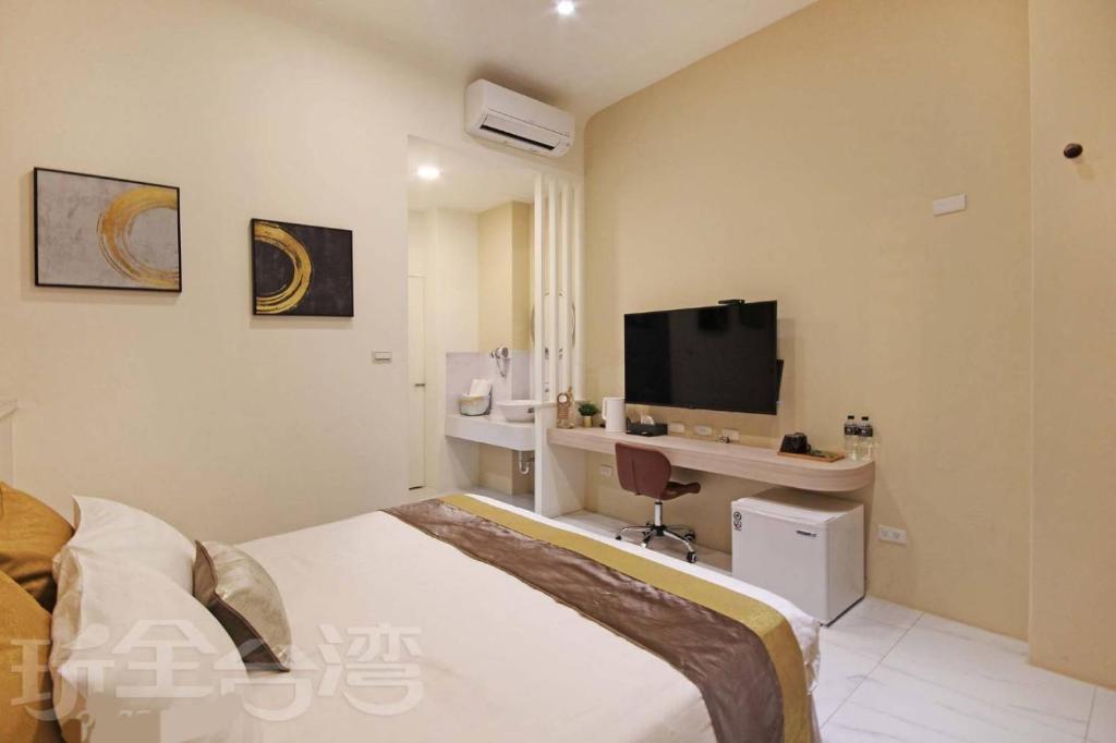 TV a/nebo společenská místnost v ubytování Station Sea B&B