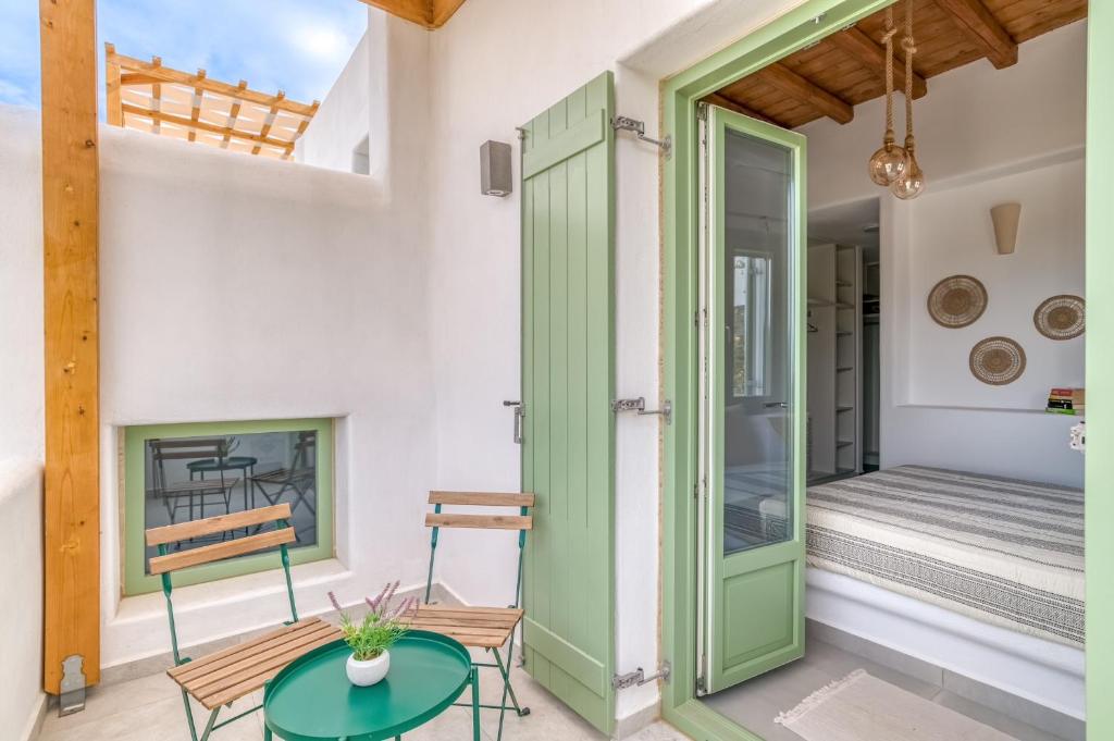 Postel nebo postele na pokoji v ubytování Lefkes View Villa