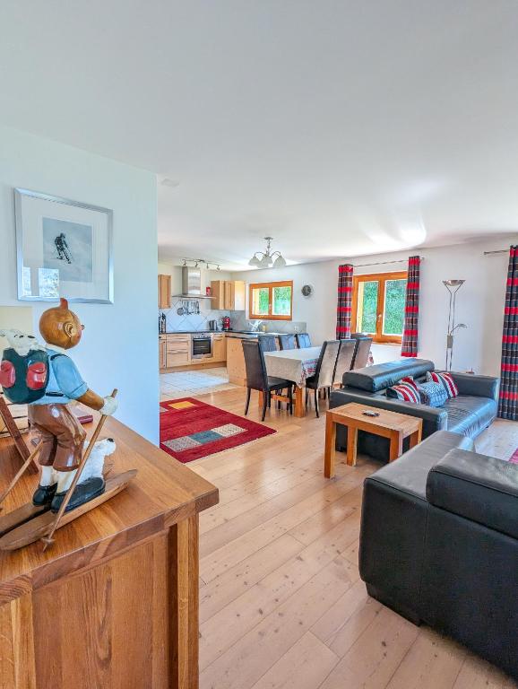 Posezení v ubytování Paisible apt cheminée, terrasse, jardin, vue époustouflante