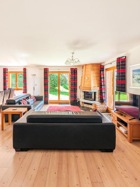Posezení v ubytování Paisible apt cheminée, terrasse, jardin, vue époustouflante