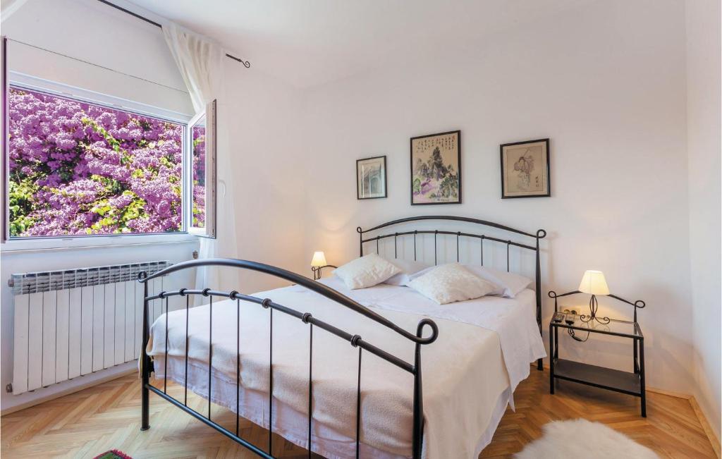 Posteľ alebo postele v izbe v ubytovaní Holiday Home Podstrana - 04