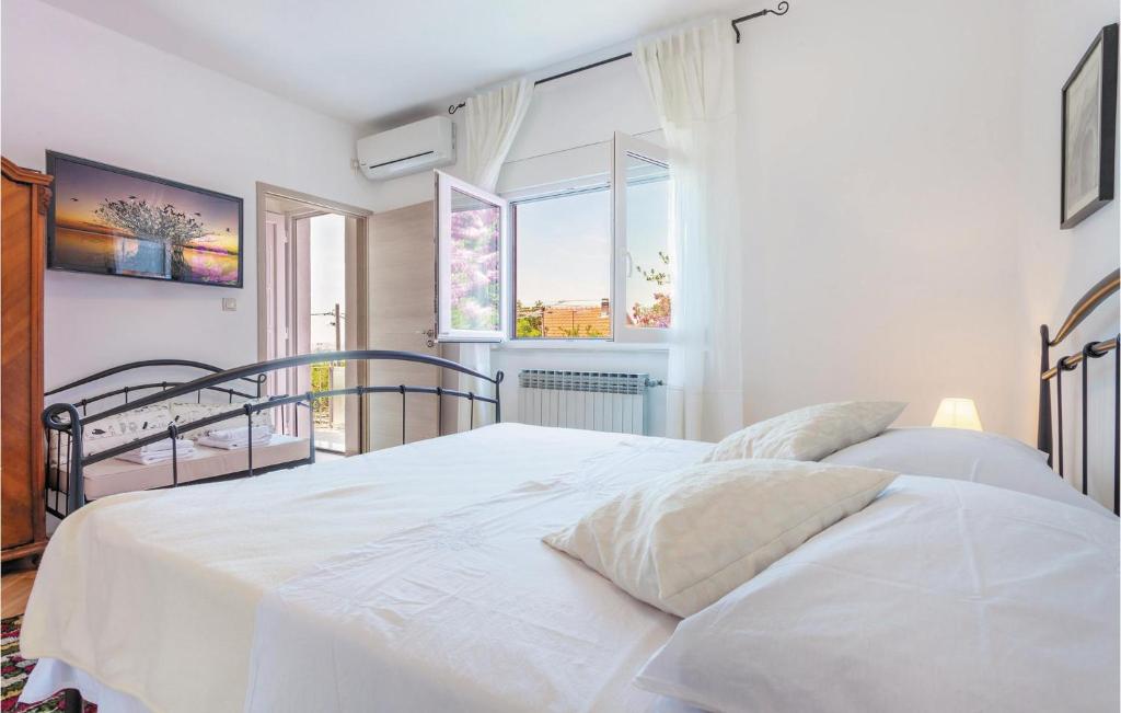 Posteľ alebo postele v izbe v ubytovaní Holiday Home Podstrana - 04
