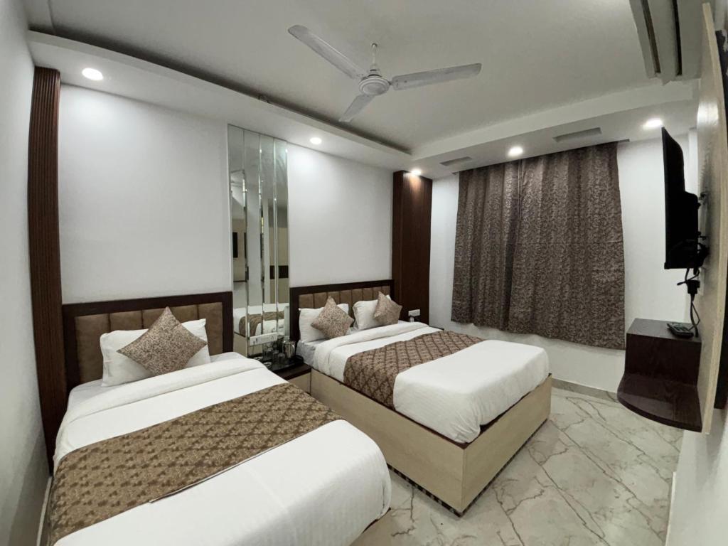 Postel nebo postele na pokoji v ubytování Hotel C & G 4 Minuit Walkable New Delhi Railway Station & 7 Minit VFS Shivaji Stadium Metro Station