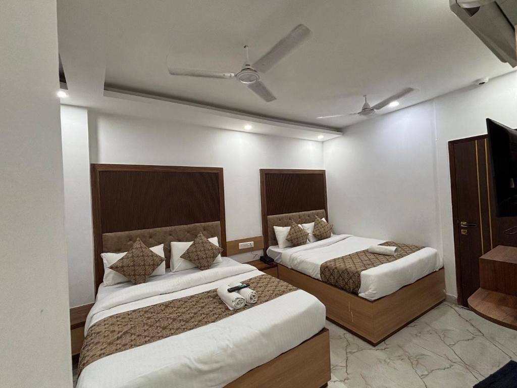 Postel nebo postele na pokoji v ubytování Hotel C & G 4 Minuit Walkable New Delhi Railway Station & 7 Minit VFS Shivaji Stadium Metro Station