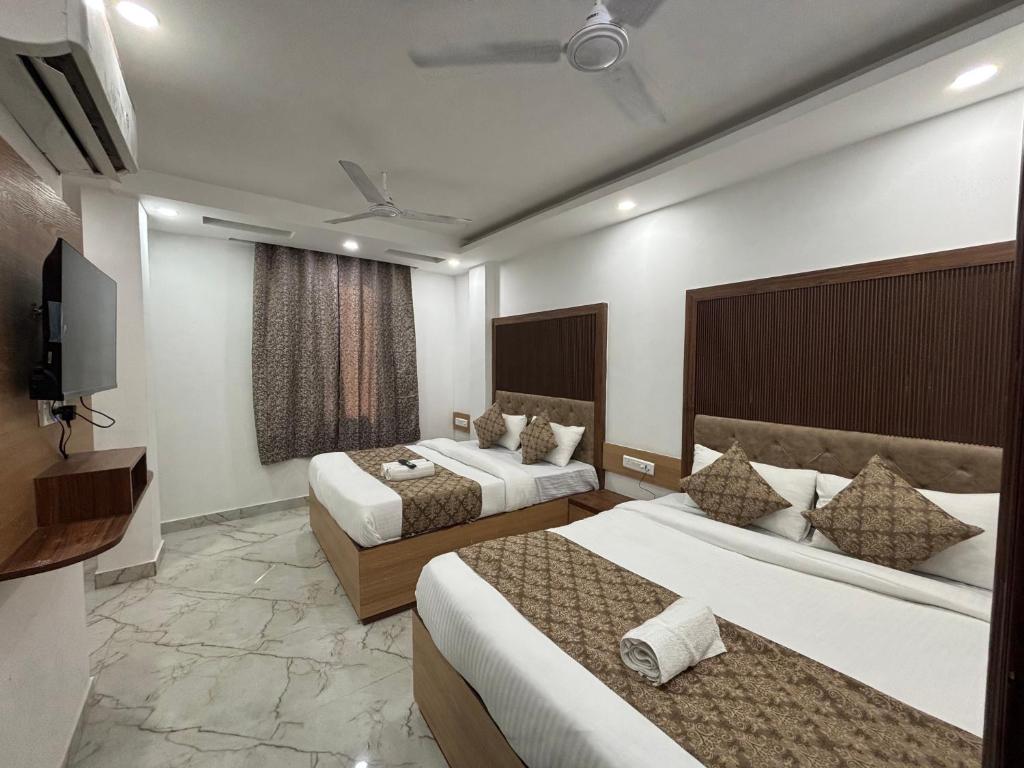 Postel nebo postele na pokoji v ubytování Hotel C & G 4 Minuit Walkable New Delhi Railway Station & 7 Minit VFS Shivaji Stadium Metro Station