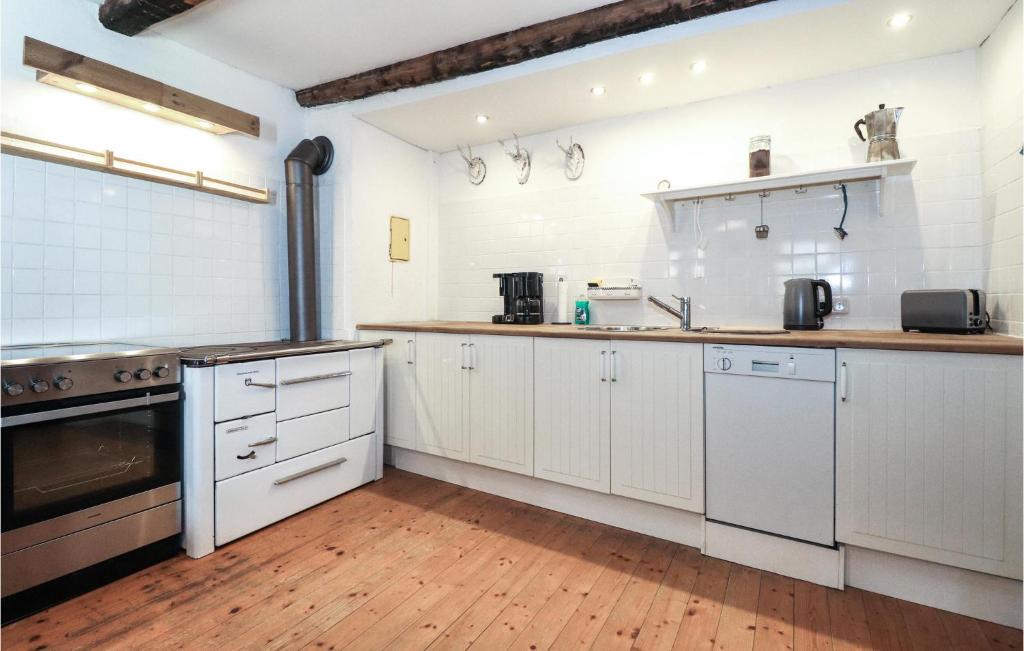 Kuchyň nebo kuchyňský kout v ubytování Ferienhaus Mit Sauna