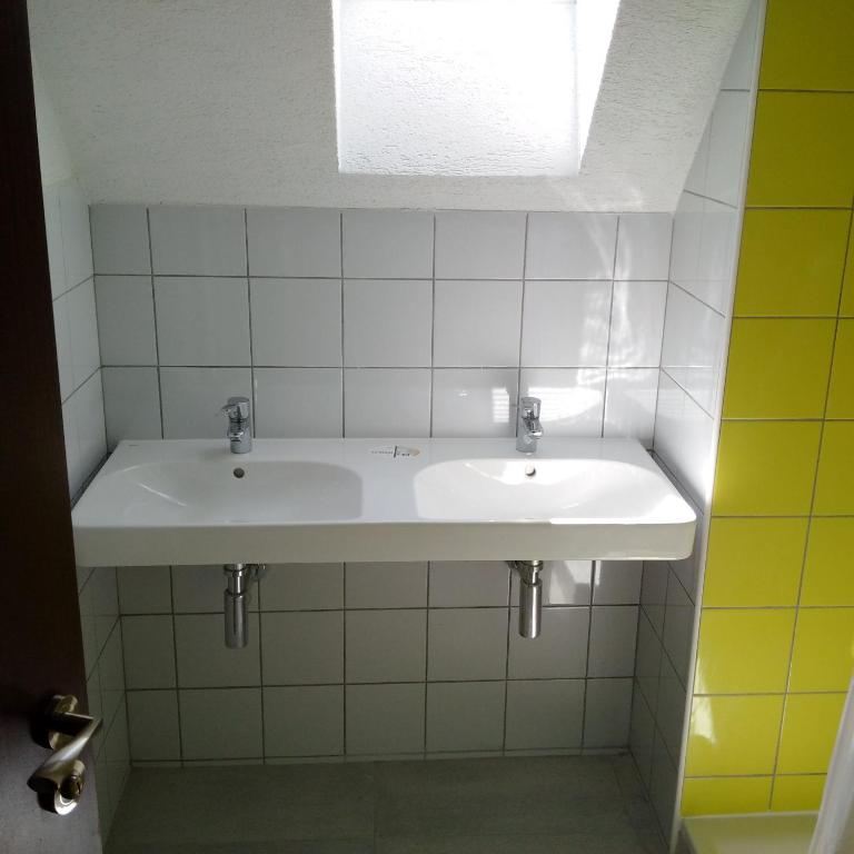 Koupelna v ubytování Hostel pod Krivanom